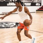 Basketball Player Wearing Colorful Sneakers on Indoor Court