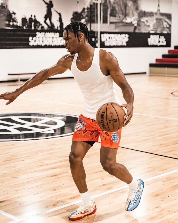 Basketball Player Wearing Colorful Sneakers on Indoor Court