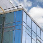 Tinting of office building windows.Exterior of a tinted building