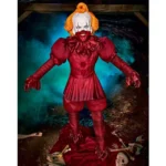 Pennywise Animatronic surrounded by red balloons and scary Halloween decorations